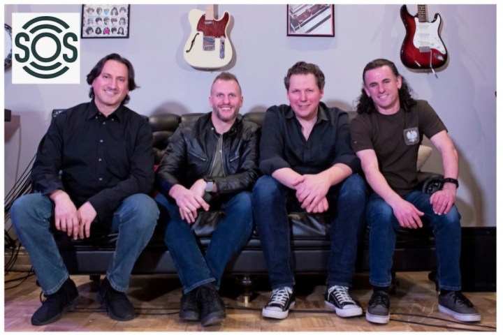 Four men sitting on a black couch in front of guitars on the wall, with 'SOS' logo in the corner.